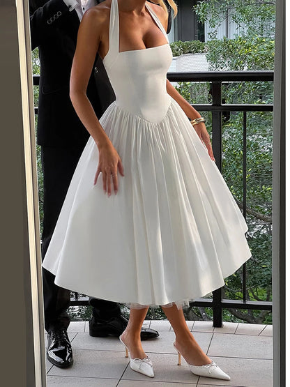 Sleeveless Midi Dress with Tie-up Halter Neck and Open Back