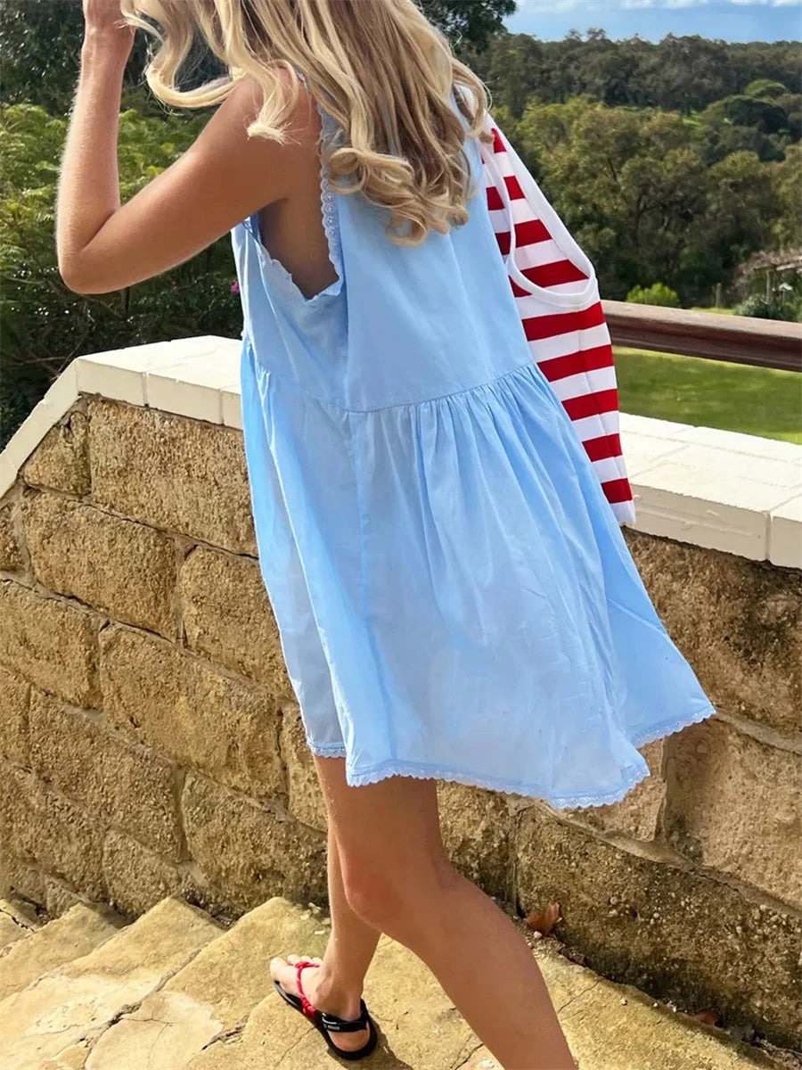 Sleeveless Floral Print Mini Dress with Deep V Neckline and Eyelet Detailing